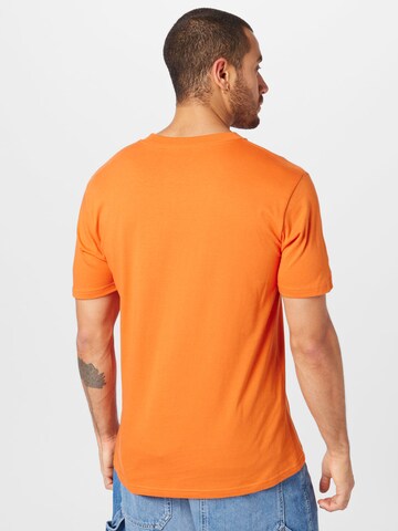 Tricou de la Carhartt WIP pe portocaliu