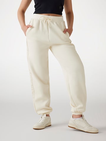 GUESS Tapered Pants in White: front