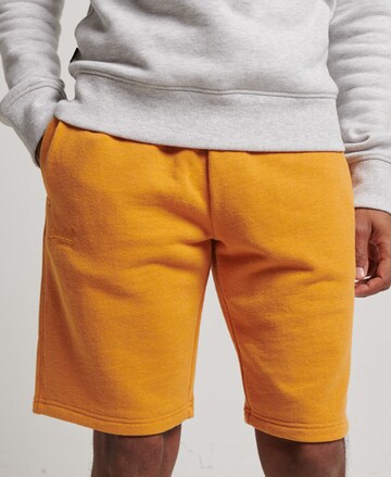 Superdry Regular Broek in Oranje: voorkant