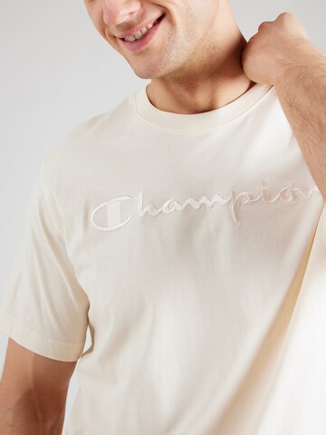 Maglietta di Champion Authentic Athletic Apparel in giallo