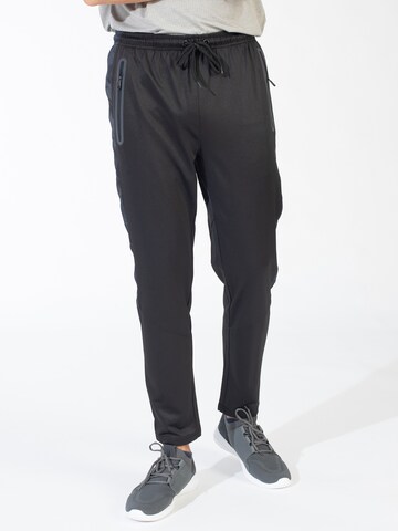 Spyder - Slimfit Pantalón deportivo en negro: frente