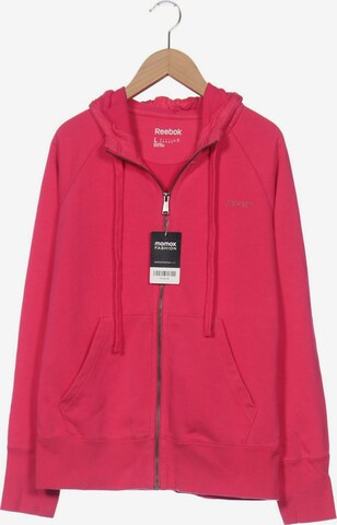 Reebok Kapuzenpullover L in Pink: predná strana