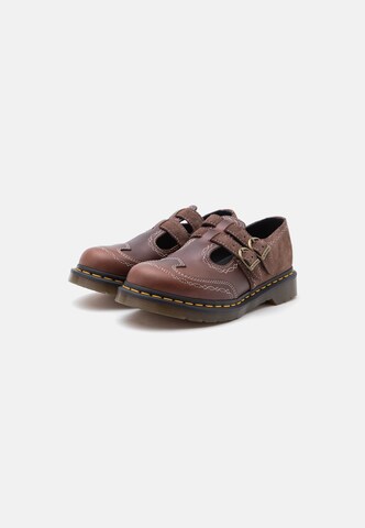 brūns Dr. Martens Iešļūcenes