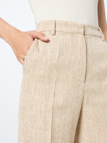 NA-KD - regular Pantalón de pinzas en beige