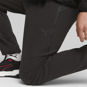 PUMA - Tapered Pantalón en negro