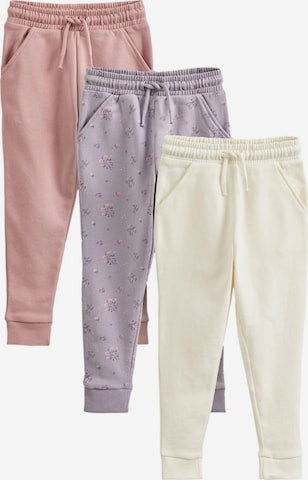 Pantaloni de la Next pe roz: față