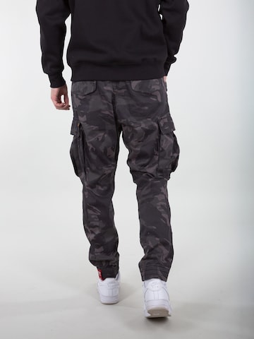 ALPHA INDUSTRIES Tapered Cargo trousers in Black