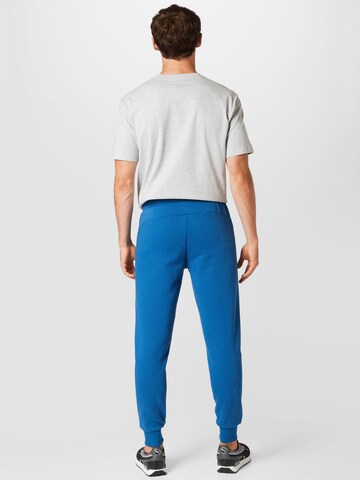 PUMA Tapered Sporthose in Blau