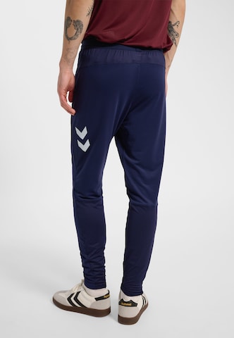 Hummel Slim fit Sports trousers in Blue