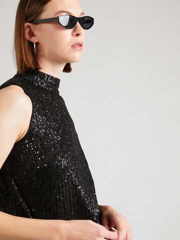 COMMA - Blusa en negro