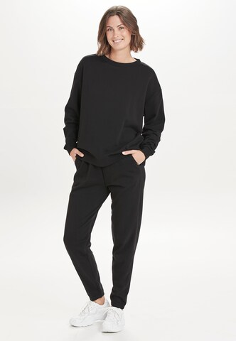 ENDURANCE Tapered Sports trousers 'Beisty' in Black