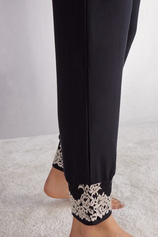 INTIMISSIMI Pyjamahose in Schwarz