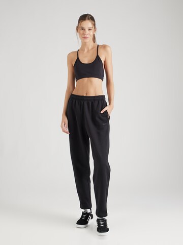 Regular Pantaloni sport de la Reebok pe negru