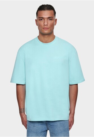 Dropsize T-shirt i blå: framsida