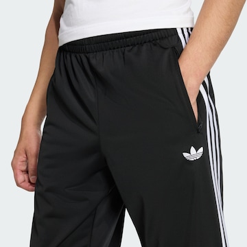 Loosefit Pantalon 'Firebird' ADIDAS ORIGINALS en noir