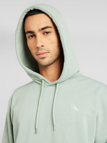 Sweat-shirt Cleptomanicx en vert