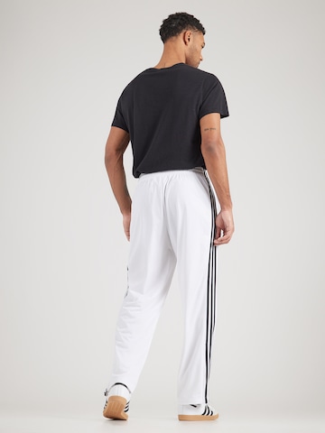 ADIDAS ORIGINALS Normalny krój Spodnie 'Firebird' w kolorze biały