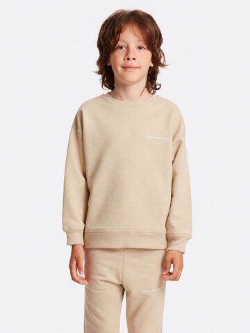GrimelangeOdjeća za vježbanje 'GRIMELANGE Rundhals-Sweatshirt-Hosen-Set' - bež boja: prednji dio