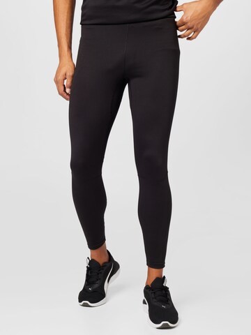 Skinny Pantaloni sport de la PUMA pe negru: față