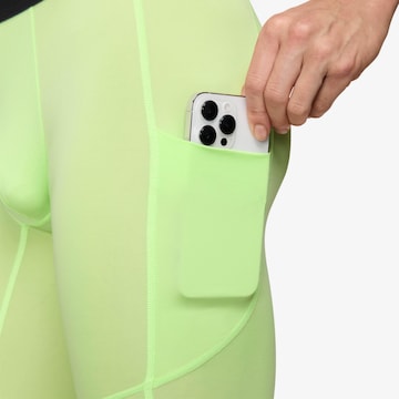 NIKE Skinny Workout Pants in Green