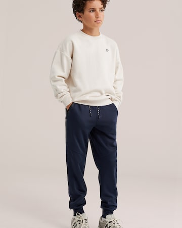 WE Fashion Tapered Trousers in Blue: front