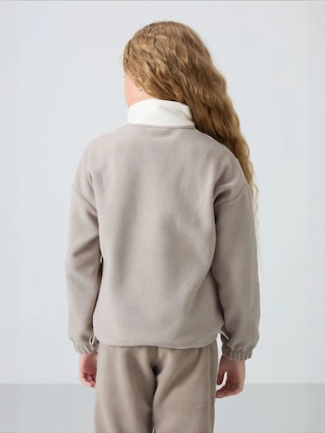 Sweat-shirt 'TOMMY Unisex Jugend-Oversize Color-Blocked Sweatshirt' Tommy Life en mélange de couleurs
