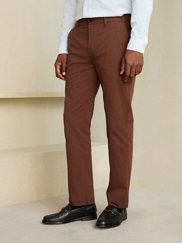 Next Slim fit Chino trousers in Brown: front