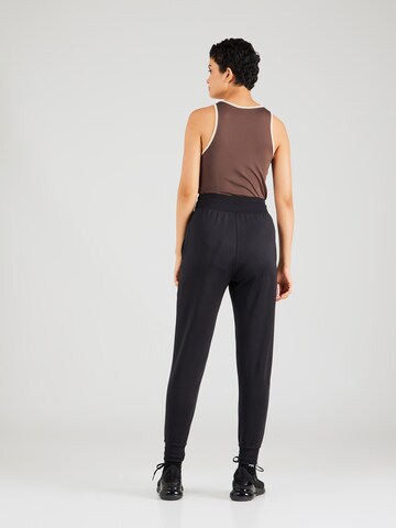 NIKE Tapered Workout Pants 'One' in Black