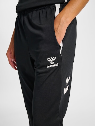 Tapered Pantaloni sportivi 'Lead 2.0' di Hummel in nero