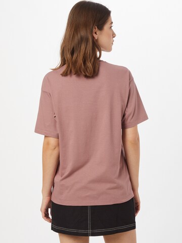 Carhartt WIP T-shirt 'Chase' i rosa