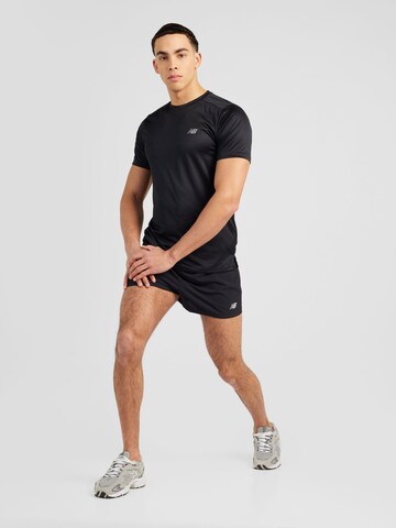 juoda new balance Marškinėliai 'Essentials Run'