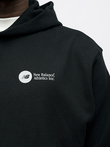 new balance Sweatshirt 'MT61M4JO' i svart