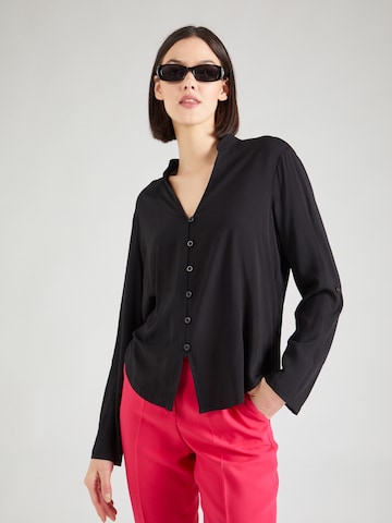 QS - Blusa em preto: frente