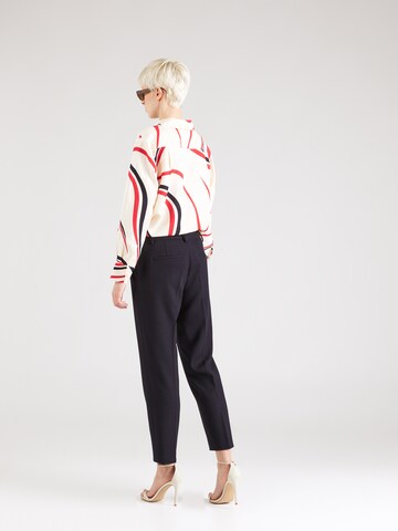 Coupe slim Pantalon à plis TOMMY HILFIGER en bleu