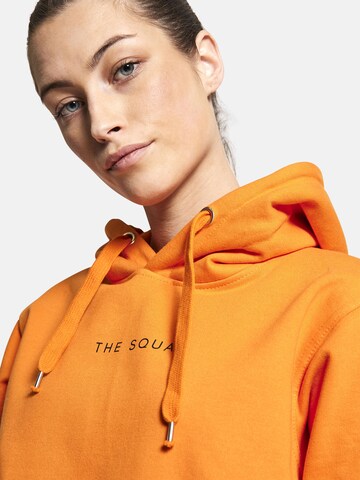 Squad the label Sweatshirt 'Organic Hooded Logo' in Orange