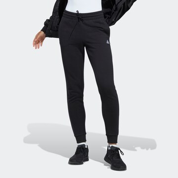 ADIDAS SPORTSWEAR Tapered Παντελόνι φόρμας 'Essentials' σε μαύρο: μπροστά