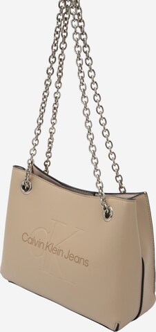 Sac bandoulière Calvin Klein Jeans en beige : devant