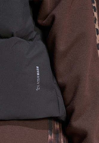 Gilet 'Helionic' di ADIDAS SPORTSWEAR in nero