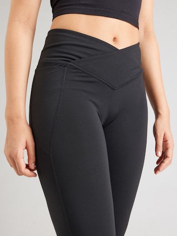 évasé Pantalon de sport 'OASIS' Fabletics en noir