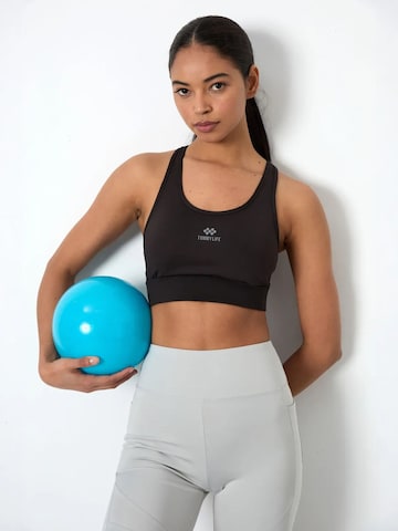 Tommy Life Sporttop in Zwart: voorkant