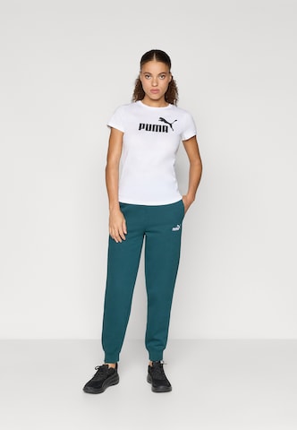 PUMA Конический (Tapered) Спортивные штаны 'ESS No. 1' в Зеленый