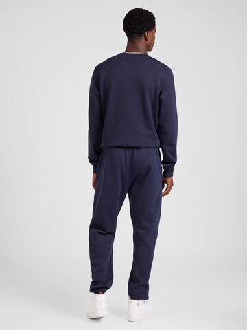 Effilé Pantalon Champion Authentic Athletic Apparel en bleu