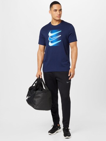 T-Shirt 'Swoosh' Nike Sportswear en bleu