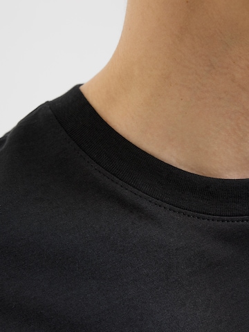 JJ Rebel T-Shirt 'JREBROCKY' in Schwarz