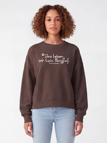 Sweat-shirt ' Das Leben ist kein Ponyhof ' Watapparel en marron : devant