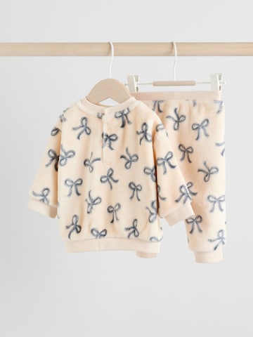 Set Next en rose