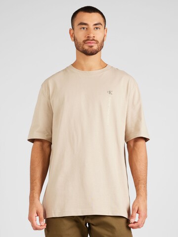 Calvin Klein Jeans Paita värissä beige: edessä