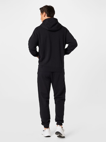 Nike Sportswear Trainingspak in Zwart