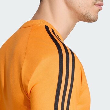 ADIDAS PERFORMANCE - Camiseta funcional 'Ajax Amsterdam' en naranja