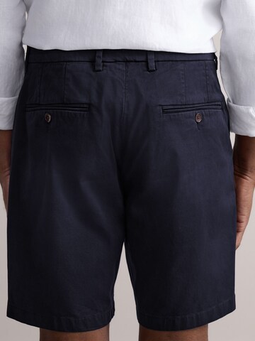 regular Pantaloni chino di Next in nero